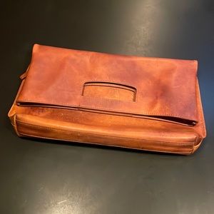 Maison Margelia 100% leather large clutch that can also double as a thin tote.